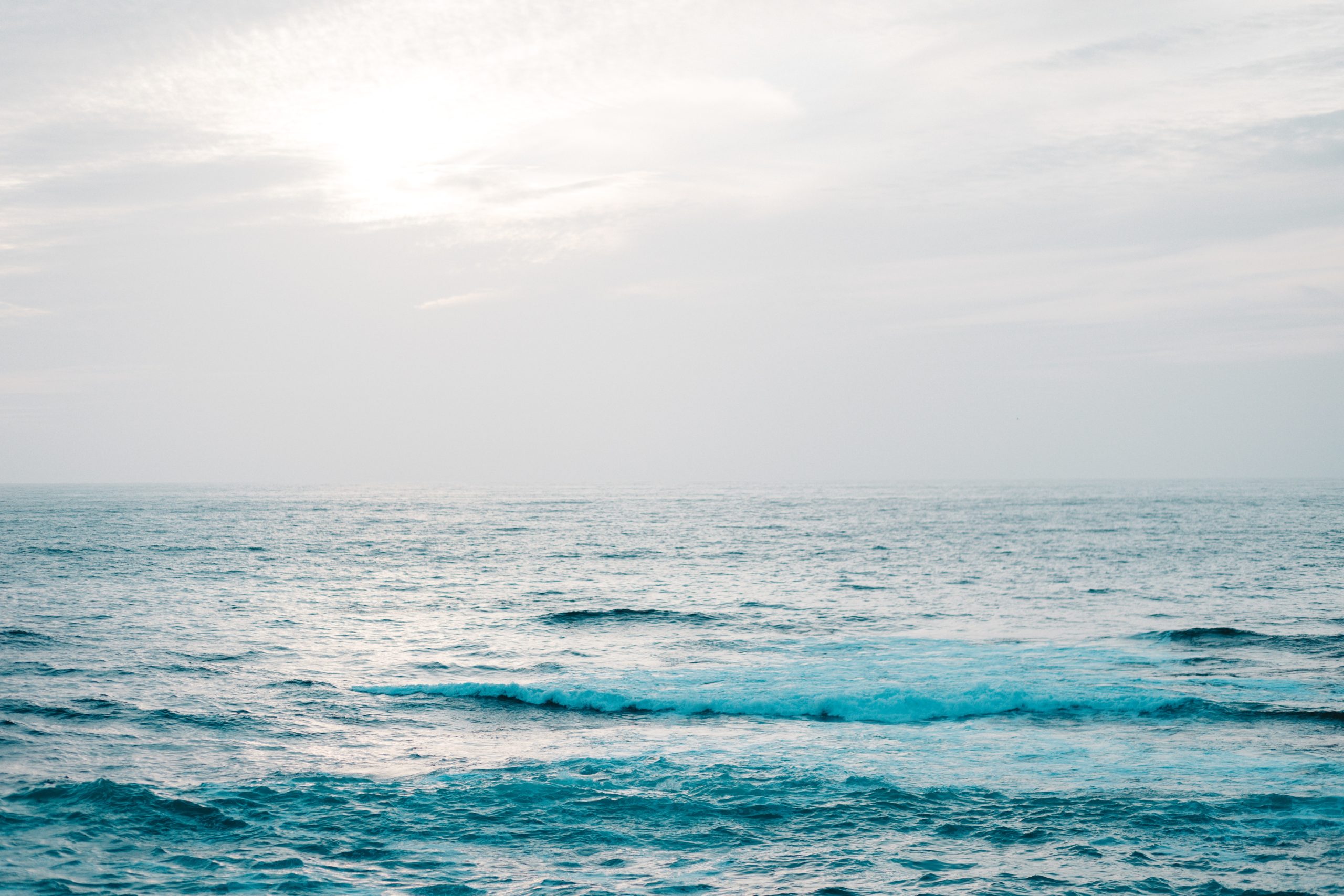 Calm blue waves, bright background