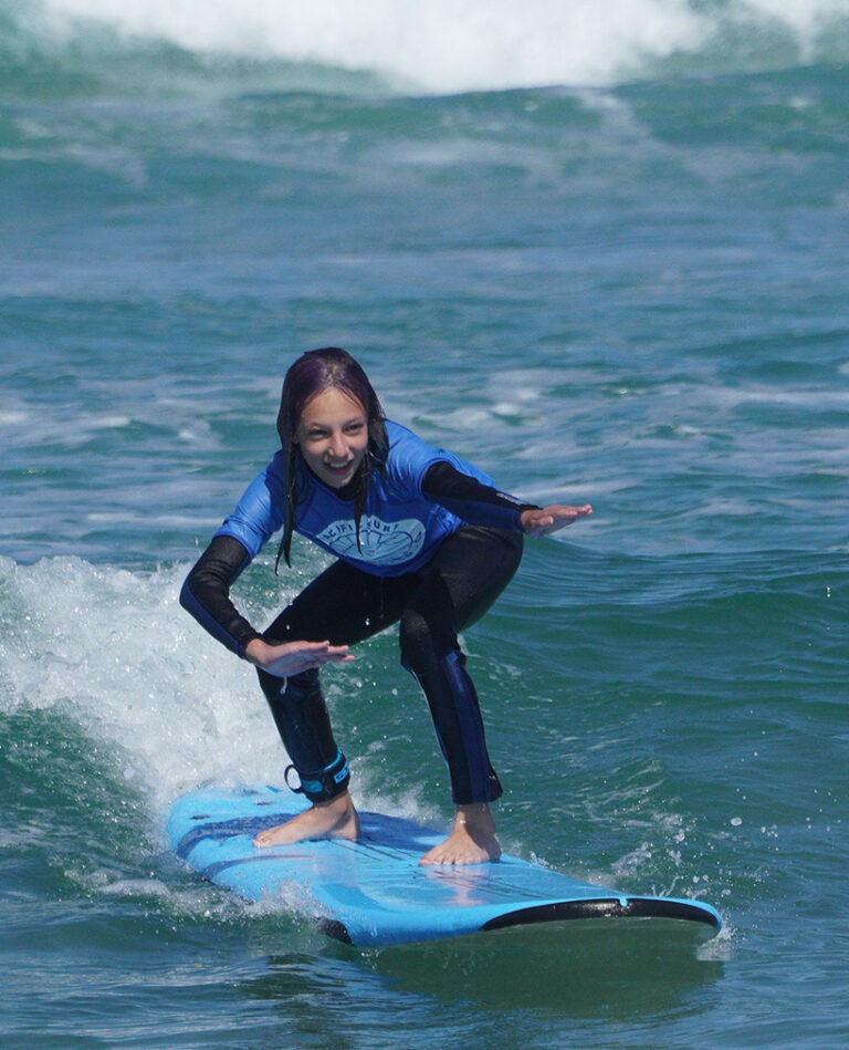 Girl Surfing in San Diego