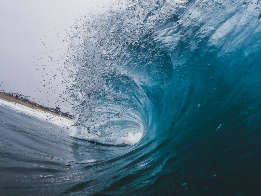 a wave with bubbles in the water
